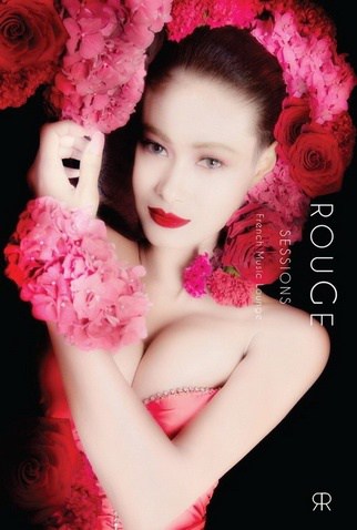 Beautiful Thai lady model wearing pink dress, lying on roses