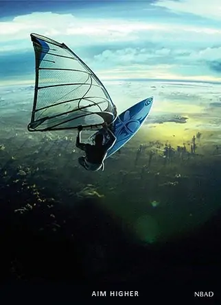 windsurfer flying in the air on a photo shoot