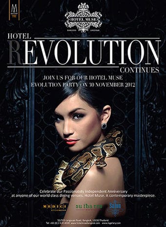 Lady model posing with snake in a bangkok marketing ad 